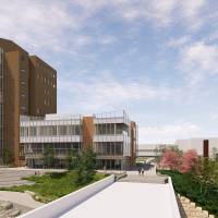 View from Blue Bridge of Building Exterior - Riverside